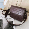 brown crocodile shoulder bag