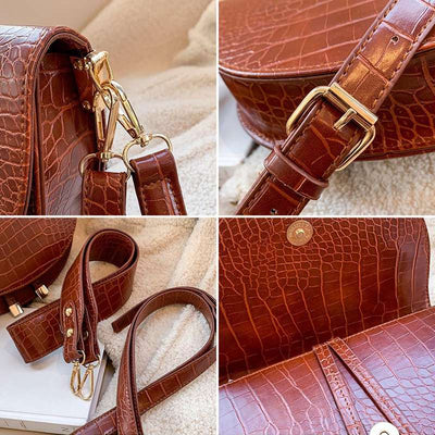 woman croc effect shoulder bag